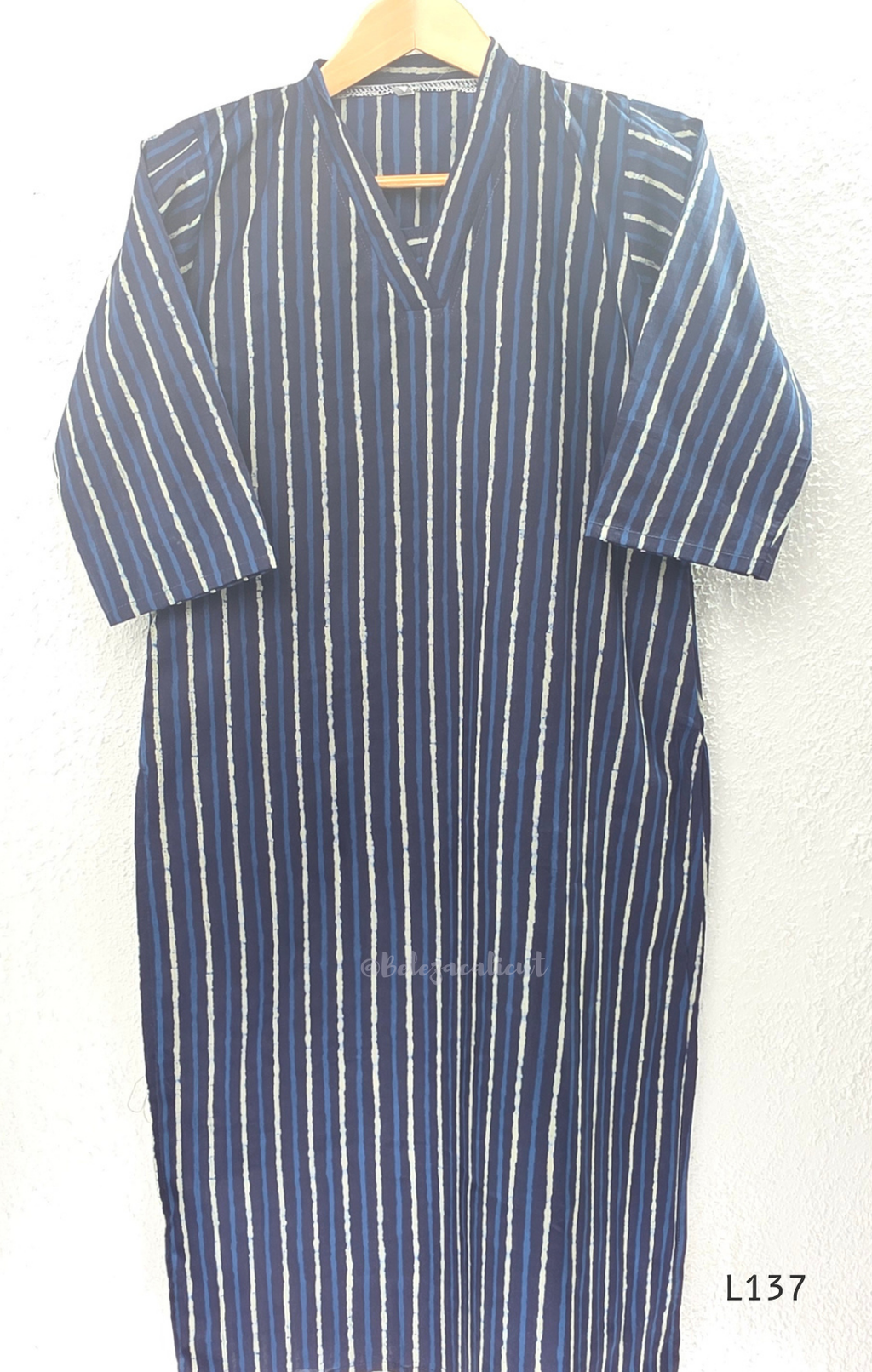 Cotton women’s ethnic top in stripe and floral print patterns with V-neck, straight fit, and everyday kurti-style design.