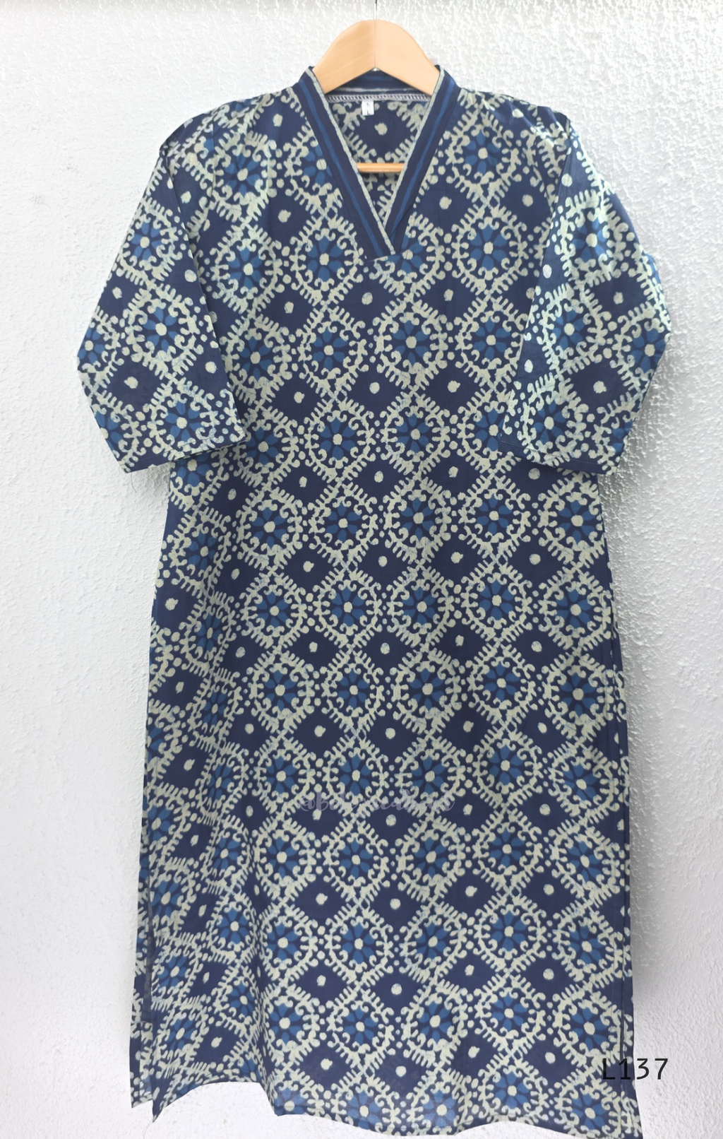 Cotton women’s ethnic top in stripe and floral print patterns with V-neck, straight fit, and everyday kurti-style design.