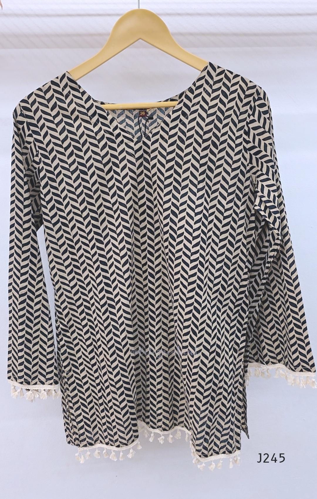 Cream cotton printed short top with bell sleeves and tassel edging, sold as a top only.