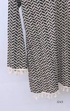 Cream cotton printed short top with bell sleeves and tassel edging, sold as a top only.