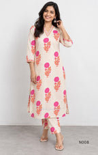 Cream flex cotton top and straight-pant co-ord set with bright pink and orange floral motifs and decorative neckline trim.