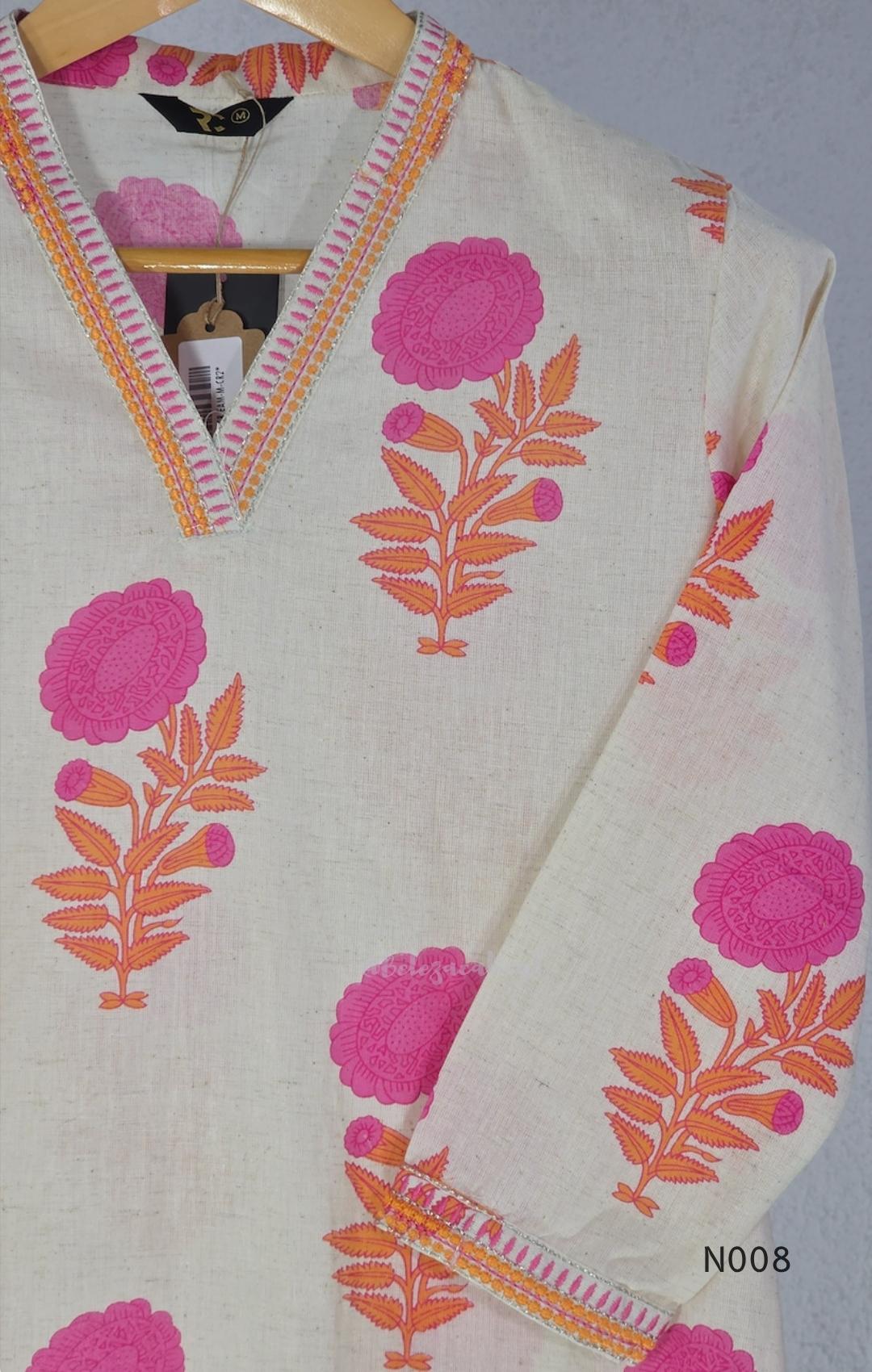 Cream flex cotton top and straight-pant co-ord set with bright pink and orange floral motifs and decorative neckline trim.