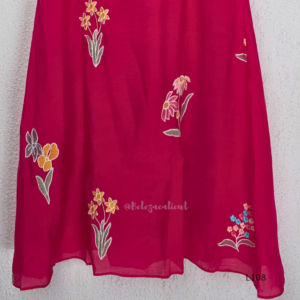 Deep magenta mul chanderi A-line kurti with colourful floral embroidery, V-neck stitch detail and 3/4 sleeves