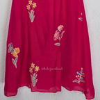 Deep magenta mul chanderi A-line kurti with colourful floral embroidery, V-neck stitch detail and 3/4 sleeves