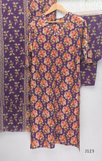 Purple Jaipur cotton churidar set with floral print, V-neck detail, matching printed bottom and dupatta.