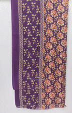 Purple Jaipur cotton churidar set with floral print, V-neck detail, matching printed bottom and dupatta.