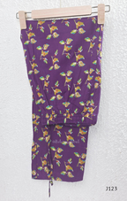 Purple Jaipur cotton churidar set with floral print, V-neck detail, matching printed bottom and dupatta.