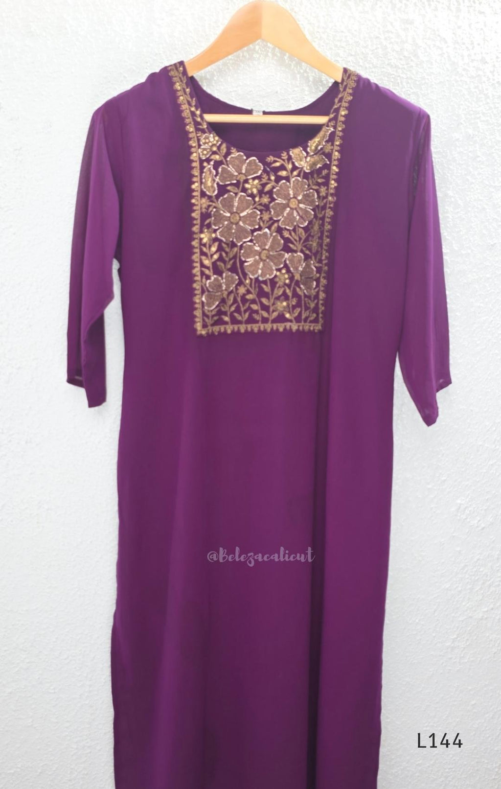 Deep purple georgette 3-piece straight ethnic set with embroidered floral yoke, matching pant and embellished dupatta.