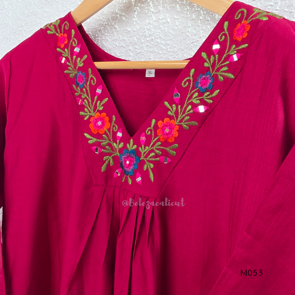 Silk blend 3-piece churidar set in teal, rani pink and rust shades with floral V-neck embroidery, printed dupatta and straight pant.