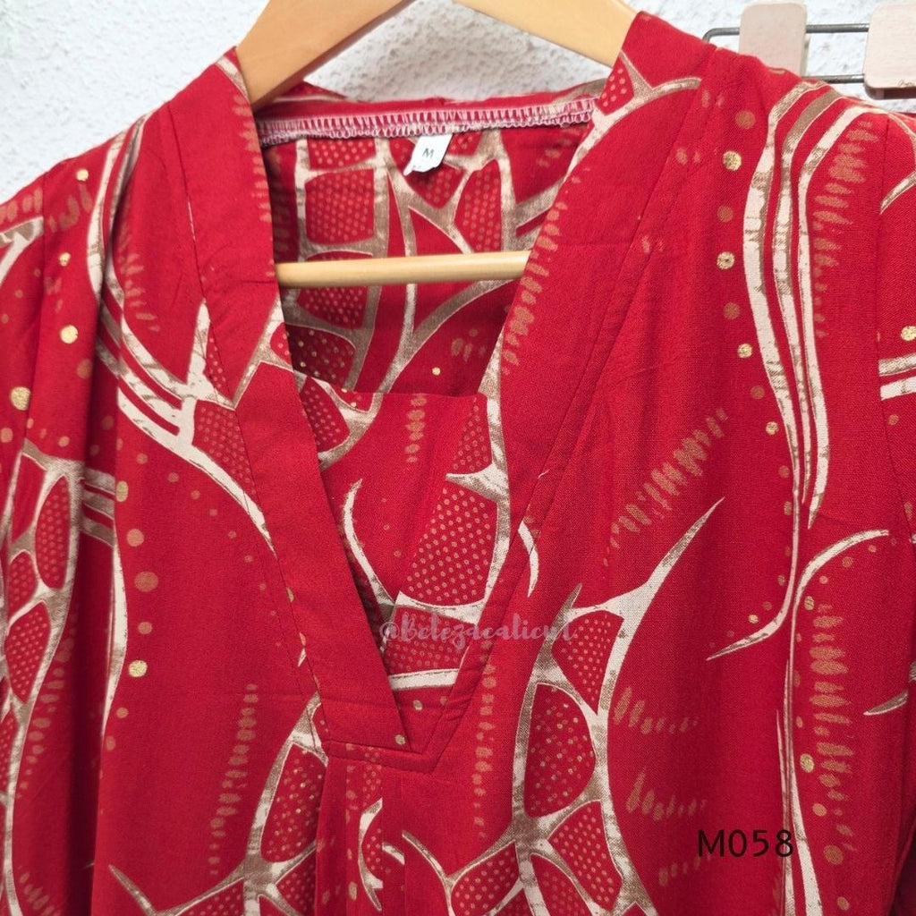 Deep red silk blend 2-piece set with cream and taupe abstract printed A-line top and matching plain red ankle-length pant.