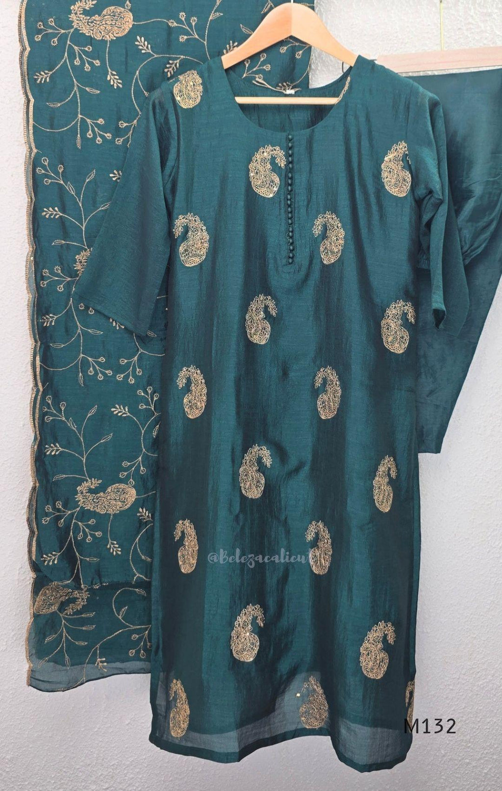 Deep teal Vichitra Silk churidar set with gold paisley work, straight bottom and coordinated embroidered dupatta.