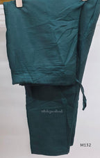 Deep teal Vichitra Silk churidar set with gold paisley work, straight bottom and coordinated embroidered dupatta.