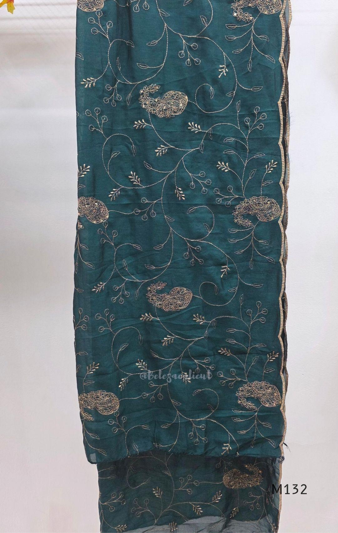 Deep teal Vichitra Silk churidar set with gold paisley work, straight bottom and coordinated embroidered dupatta.