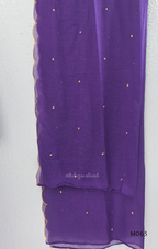 Purple cotton 3-piece churidar set with yellow floral embroidery, V-neck, matching dupatta and plain bottom.