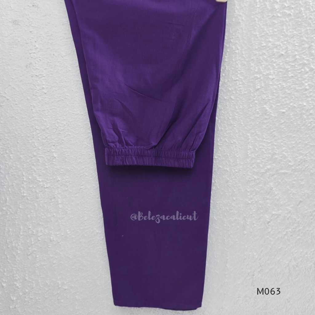 Purple cotton 3-piece churidar set with yellow floral embroidery, V-neck, matching dupatta and plain bottom.