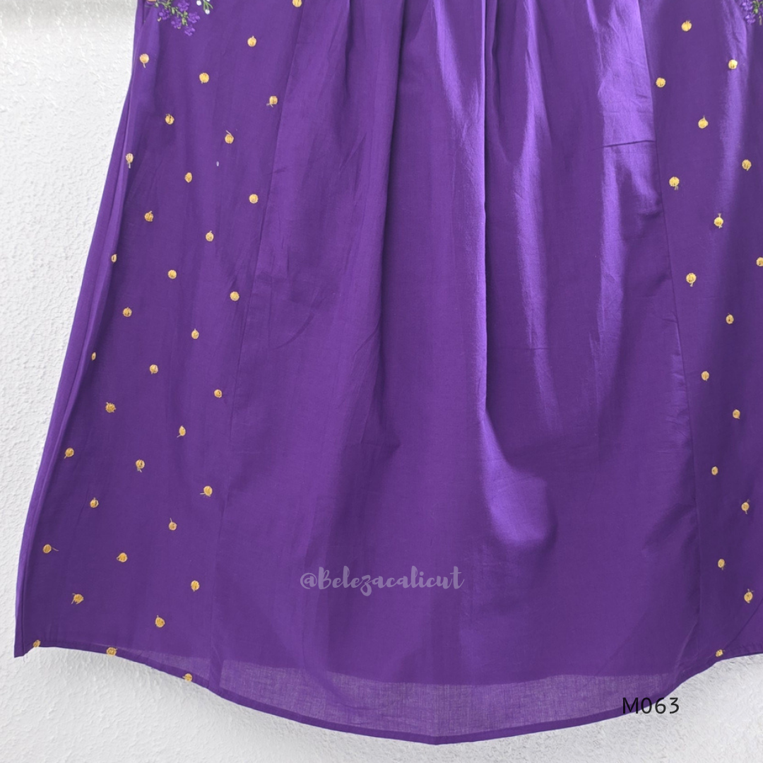 Purple cotton 3-piece churidar set with yellow floral embroidery, V-neck, matching dupatta and plain bottom.