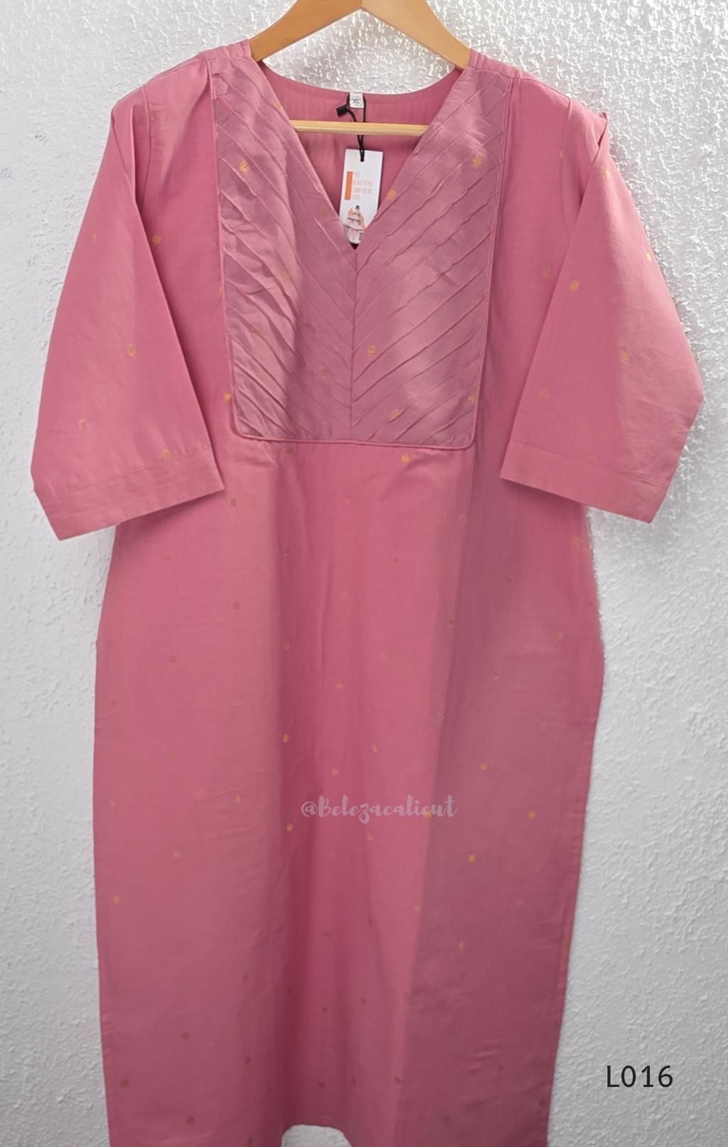 Dusty rose cotton lined 3-piece ethnic set with V-neck pintuck yoke, matching pant and textured tassel dupatta.