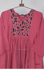 Dusty rose pink Mul Chanderi full churidar set with black leaf-shaped neckline work, matching straight pants and chiffon dupatta.