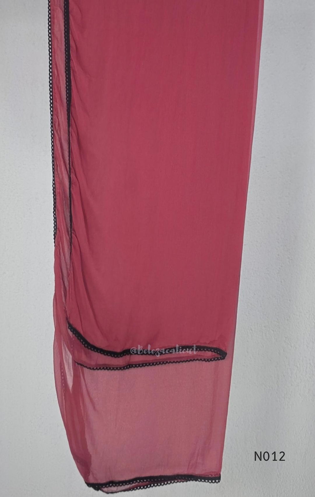 Dusty rose pink Mul Chanderi full churidar set with black leaf-shaped neckline work, matching straight pants and chiffon dupatta.