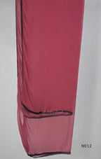 Dusty rose pink Mul Chanderi full churidar set with black leaf-shaped neckline work, matching straight pants and chiffon dupatta.