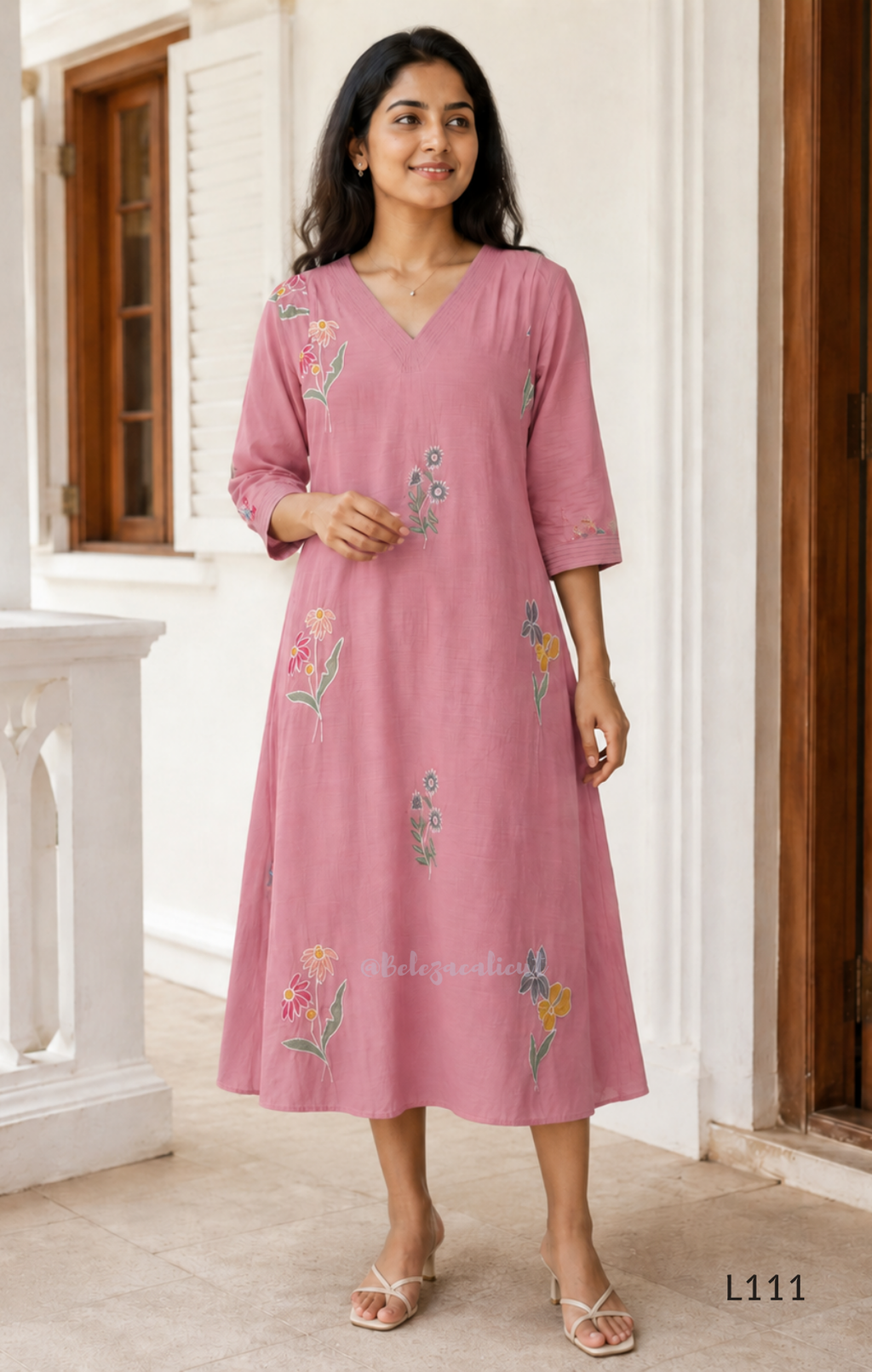 Dusty rose pink mul chanderi A-line kurti with scattered floral embroidery, V-neck stitch detail and 3/4 sleeves