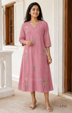 Dusty rose pink mul chanderi A-line kurti with scattered floral embroidery, V-neck stitch detail and 3/4 sleeves