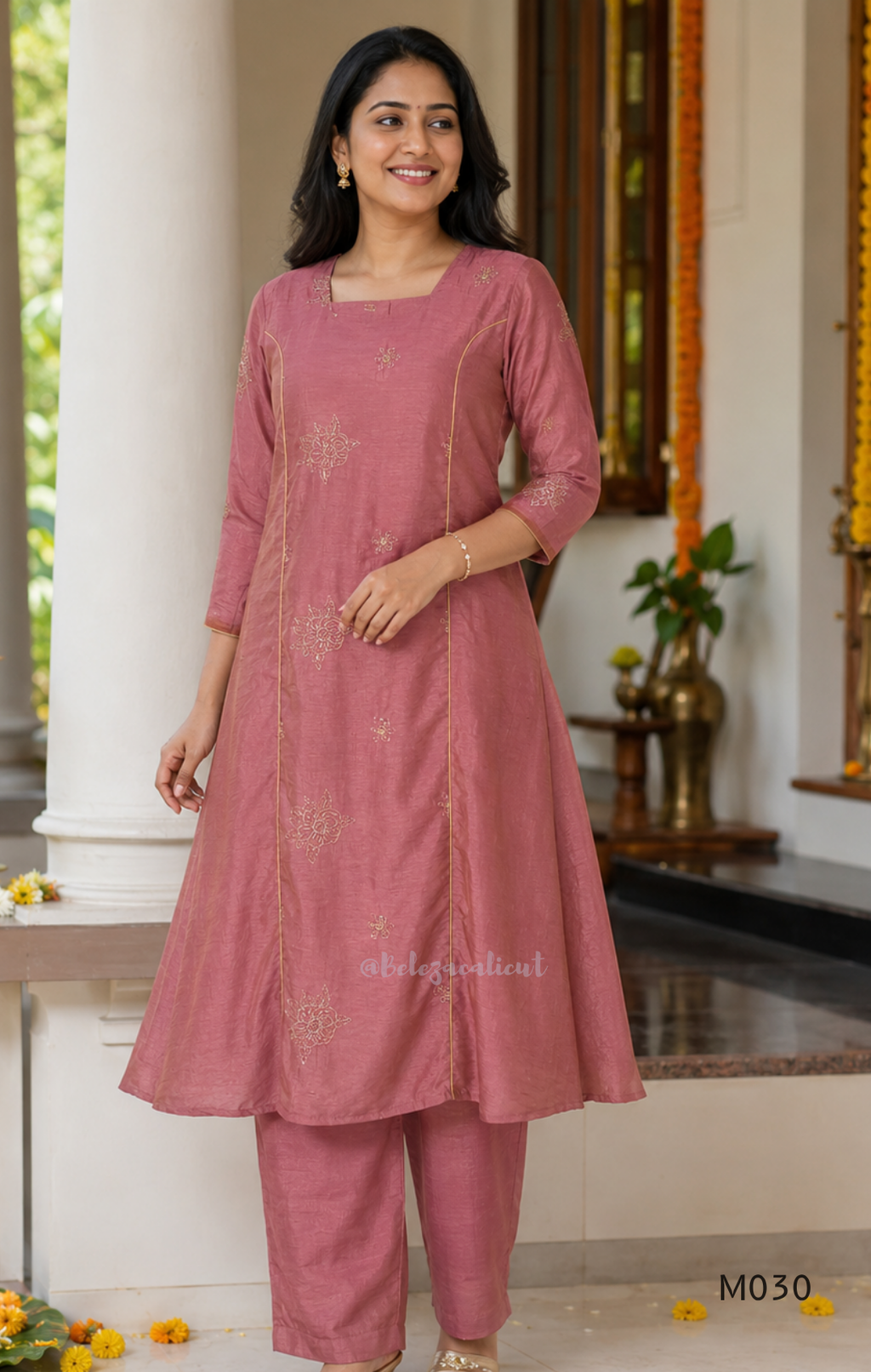 Dusty rose 2-piece kurti set with gold floral motifs, gold piping detail, matching bottom, 3/4 sleeves, and relaxed flared fit.