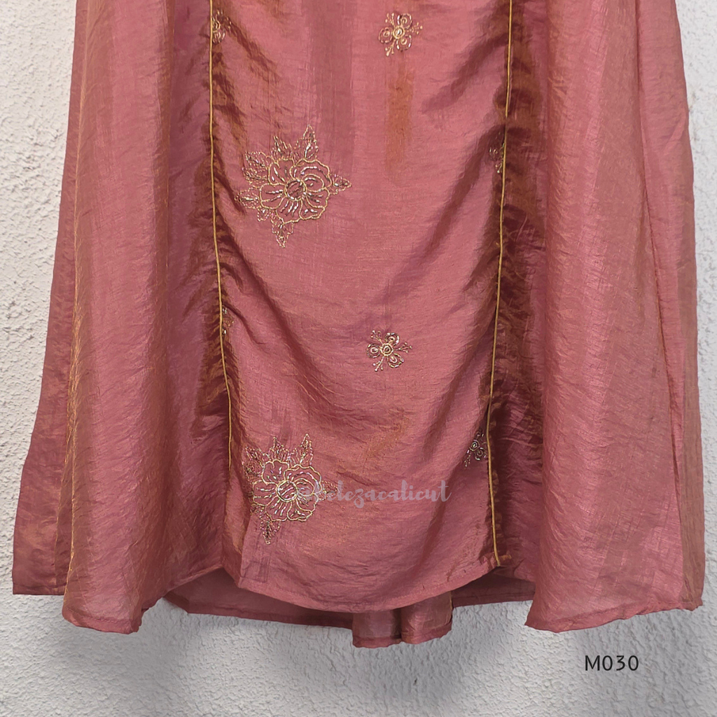 Dusty rose 2-piece kurti set with gold floral motifs, gold piping detail, matching bottom, 3/4 sleeves, and relaxed flared fit.