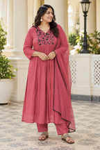 Dusty rose pink Mul Chanderi full churidar set with black leaf-shaped neckline work, matching straight pants and chiffon dupatta.