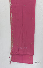 Pink, lavender, teal and mustard crushed silk churidar sets with gold-toned embroidery, matching bottoms and dupattas.