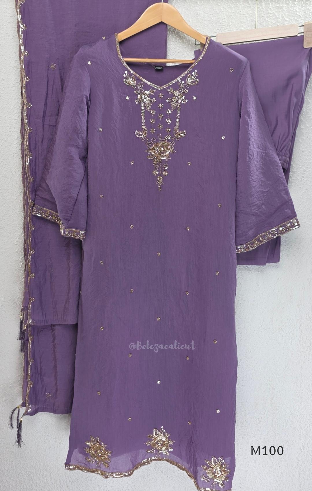 Pink, lavender, teal and mustard crushed silk churidar sets with gold-toned embroidery, matching bottoms and dupattas.