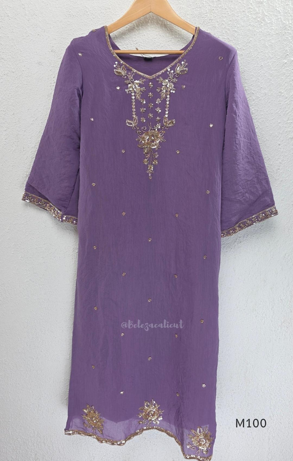 Pink, lavender, teal and mustard crushed silk churidar sets with gold-toned embroidery, matching bottoms and dupattas.