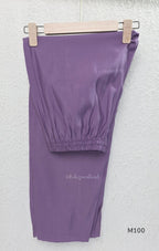 Pink, lavender, teal and mustard crushed silk churidar sets with gold-toned embroidery, matching bottoms and dupattas.