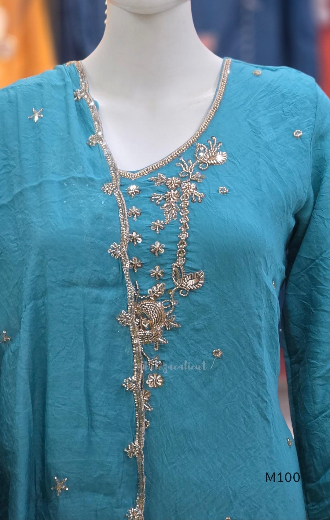 Pink, lavender, teal and mustard crushed silk churidar sets with gold-toned embroidery, matching bottoms and dupattas.