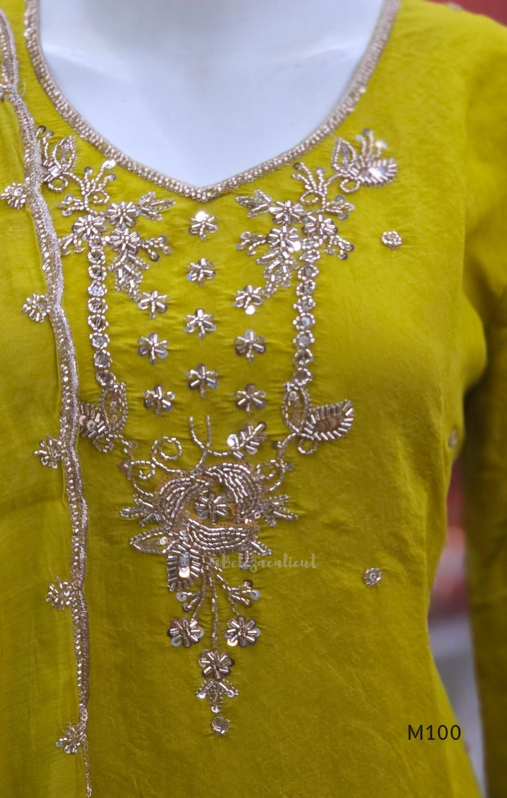 Pink, lavender, teal and mustard crushed silk churidar sets with gold-toned embroidery, matching bottoms and dupattas.