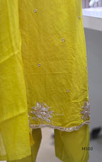 Pink, lavender, teal and mustard crushed silk churidar sets with gold-toned embroidery, matching bottoms and dupattas.