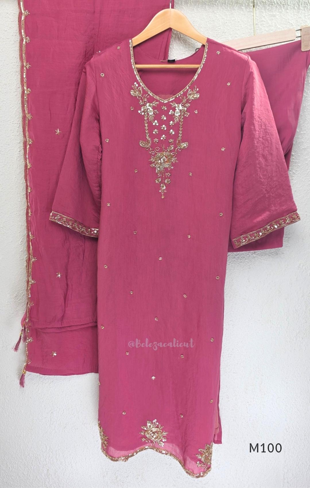 Pink, lavender, teal and mustard crushed silk churidar sets with gold-toned embroidery, matching bottoms and dupattas.