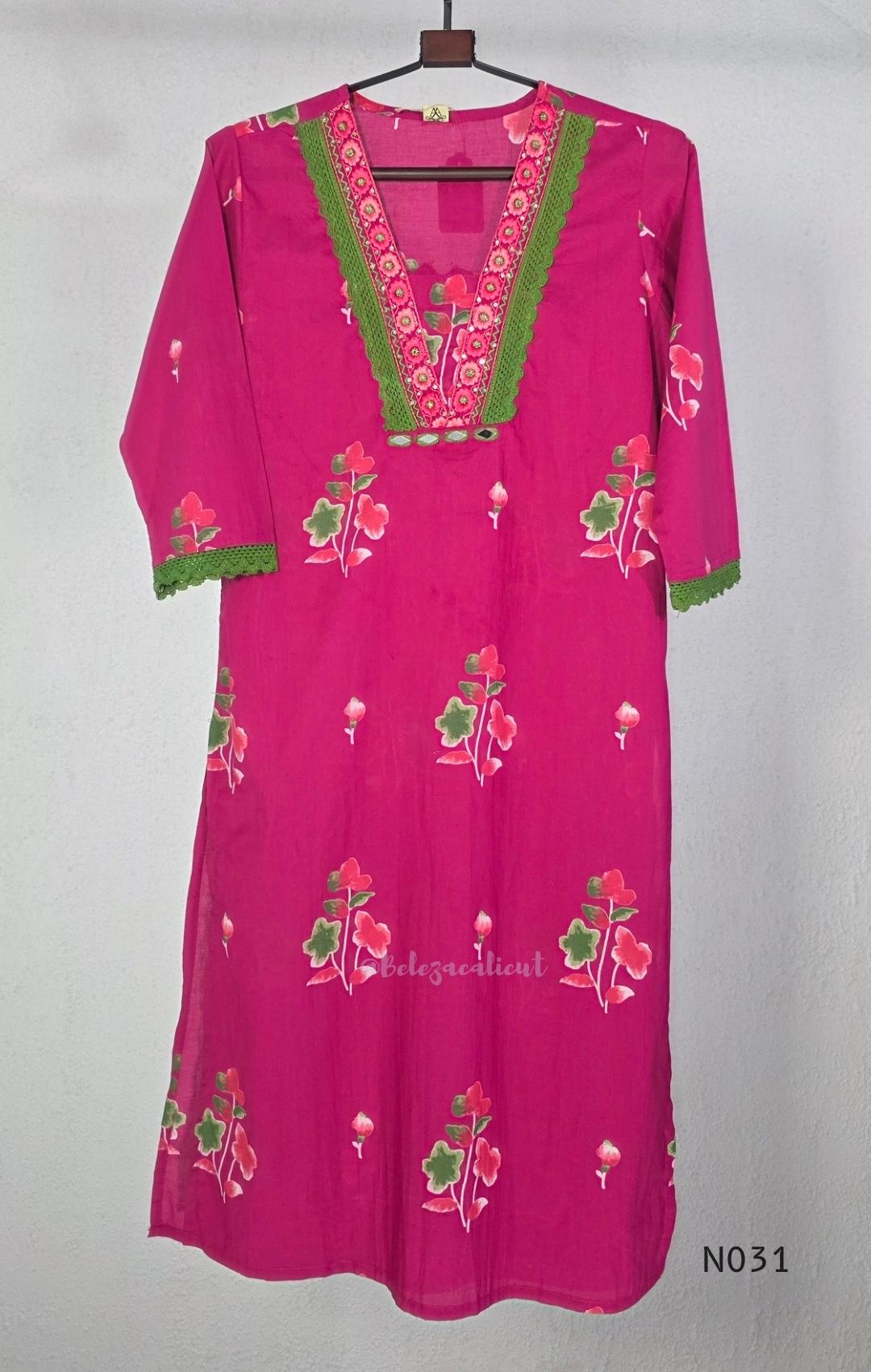 Pink cotton three-piece churidar set with floral print, green lace and embroidered neckline details, plain wide palazzo pants and a floral-border dupatta. - view 3