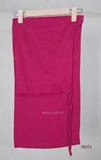 Pink cotton three-piece churidar set with floral print, green lace and embroidered neckline details, plain wide palazzo pants and a floral-border dupatta. - view 6