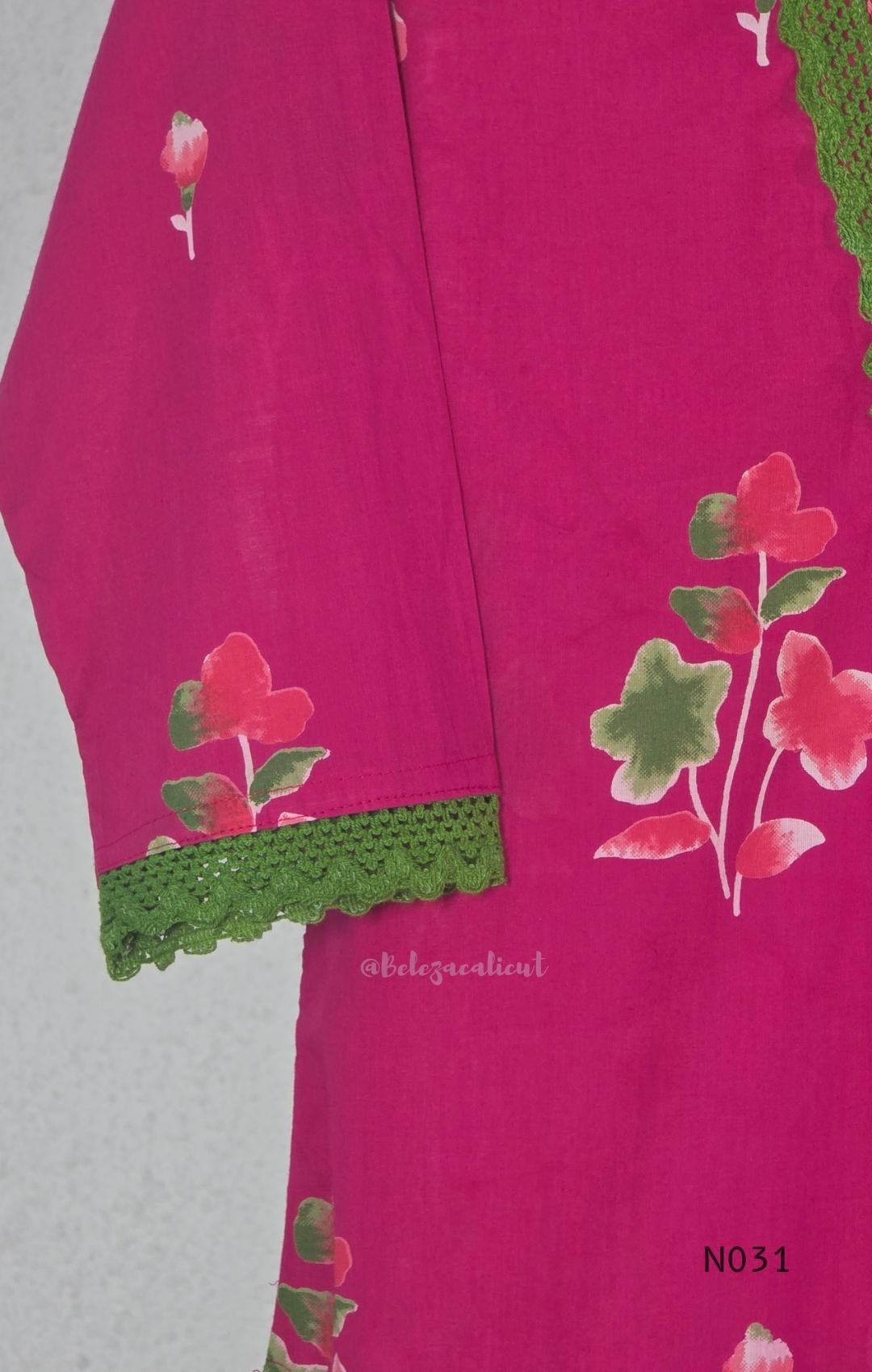 Pink cotton three-piece churidar set with floral print, green lace and embroidered neckline details, plain wide palazzo pants and a floral-border dupatta. - view 7