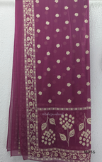 Grape cotton churidar set with cream floral stem print, stitched mirror-style yoke work, matching printed dupatta, plain bottom, and 3/4 sleeves.
