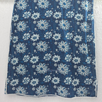 Indigo blue Jaipur cotton 3-piece churidar set with white floral print, embroidered V-neck, printed dupatta and matching printed bottom.