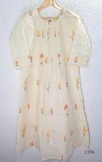 Ivory Cora Cotton churidar set with pink and yellow floral embroidery, matching straight pants and embroidered dupatta.