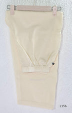 Ivory Cora Cotton churidar set with pink and yellow floral embroidery, matching straight pants and embroidered dupatta.