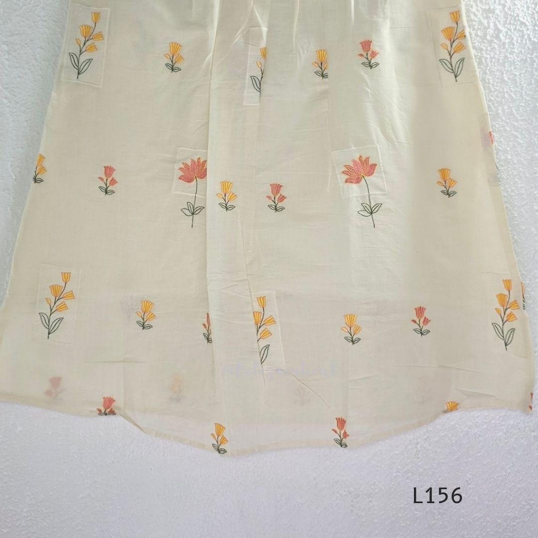Ivory Cora Cotton churidar set with pink and yellow floral embroidery, matching straight pants and embroidered dupatta.