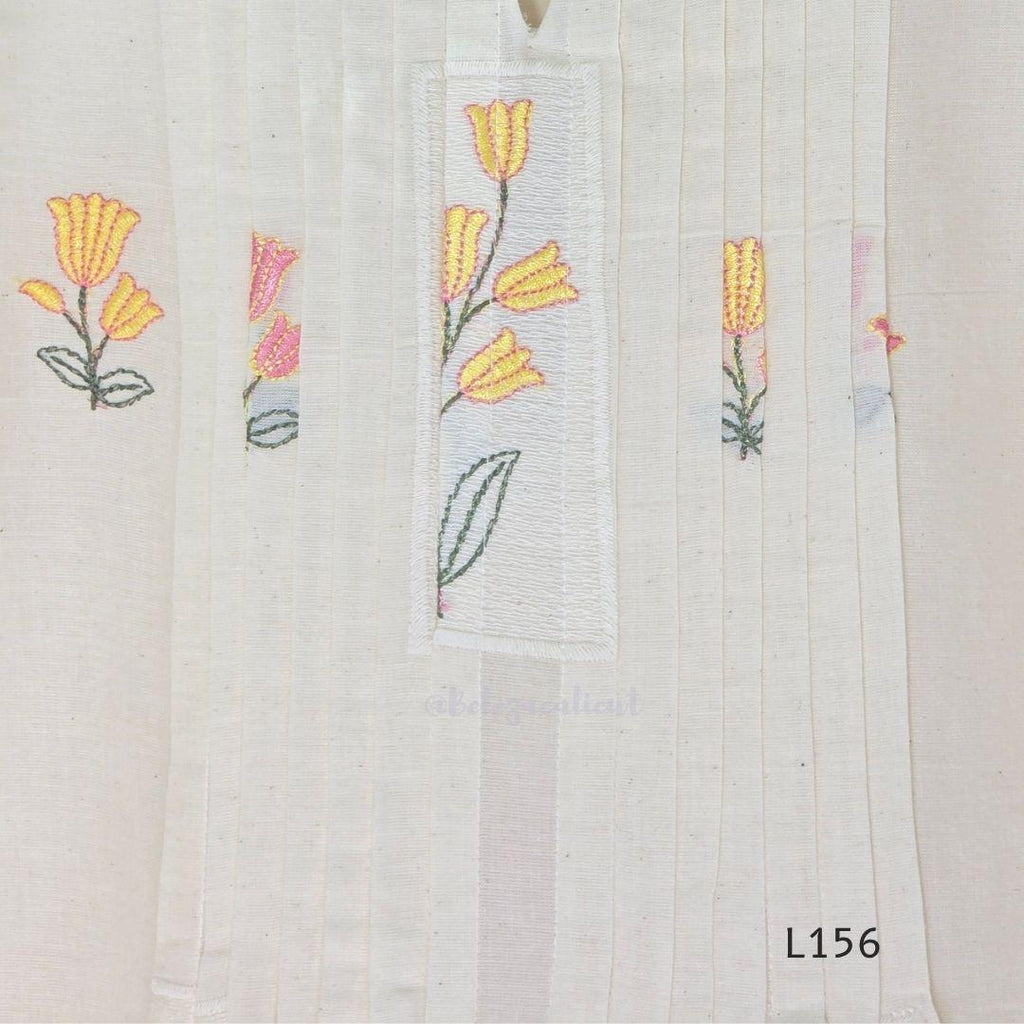 Ivory Cora Cotton churidar set with pink and yellow floral embroidery, matching straight pants and embroidered dupatta.