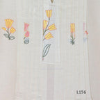Ivory Cora Cotton churidar set with pink and yellow floral embroidery, matching straight pants and embroidered dupatta.
