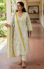  Ivory cotton churidar set with yellow and aqua paisley print and matching dupatta.