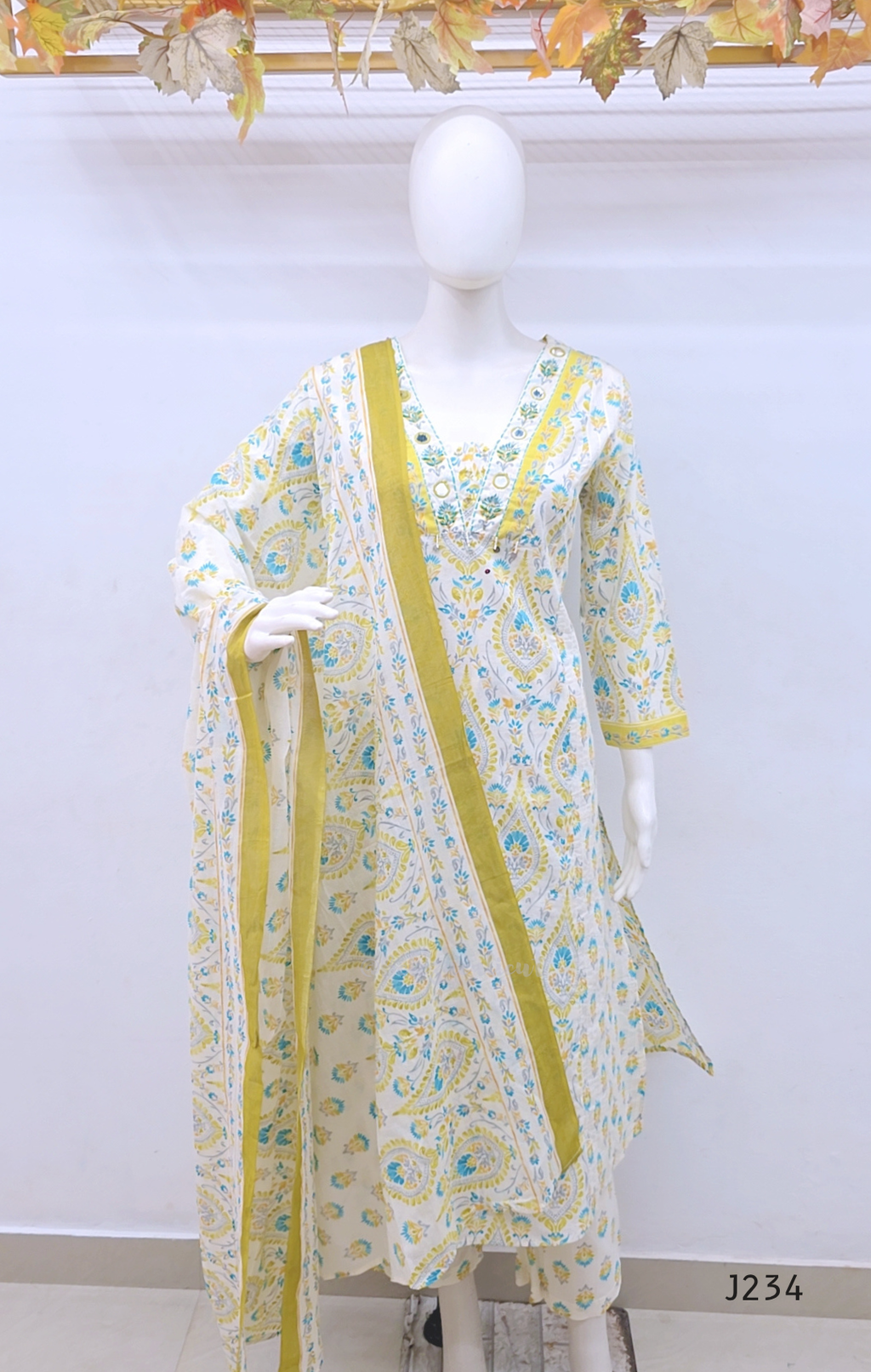 Ivory cotton churidar set with yellow and aqua paisley print and matching dupatta.