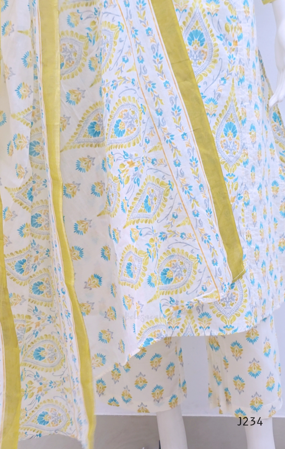  Ivory cotton churidar set with yellow and aqua paisley print and matching dupatta.